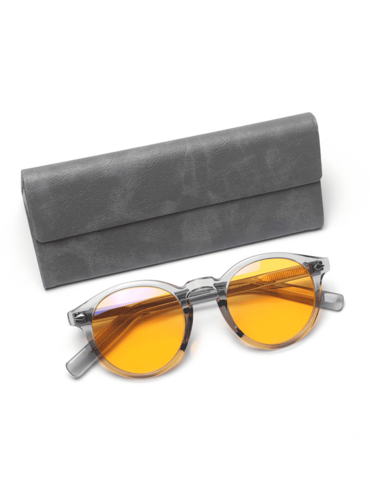 Nimbus 9003 runde transparente Brille mit orangefarbenen Gläsern und grauem Lederetui